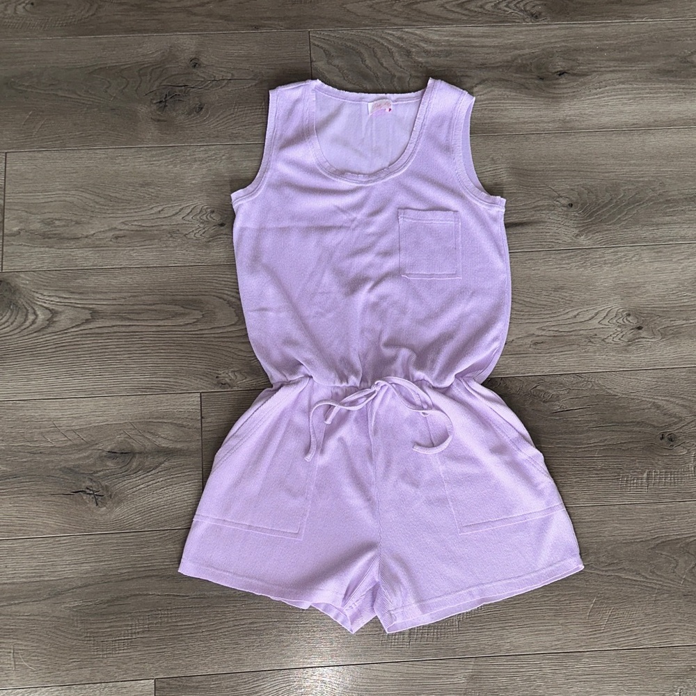 Pink Lily Light Purple romper.